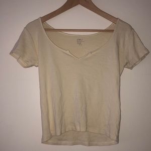 BM pastel yellow tee